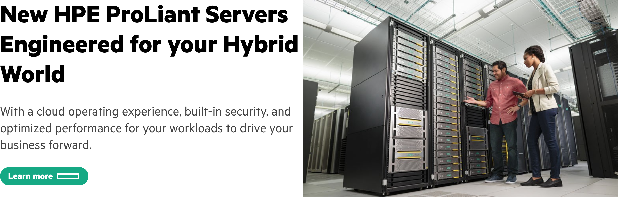 Hero section with a heading, paragraph, button, and image of two IT professionals inspecting a server rack.